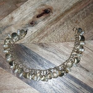 Vintage Reissued Clam Shell Gold and Pearl Shell Charm Bracelet